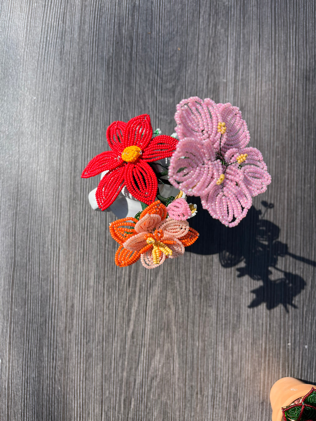 Sunset colored beaded flower arrangement