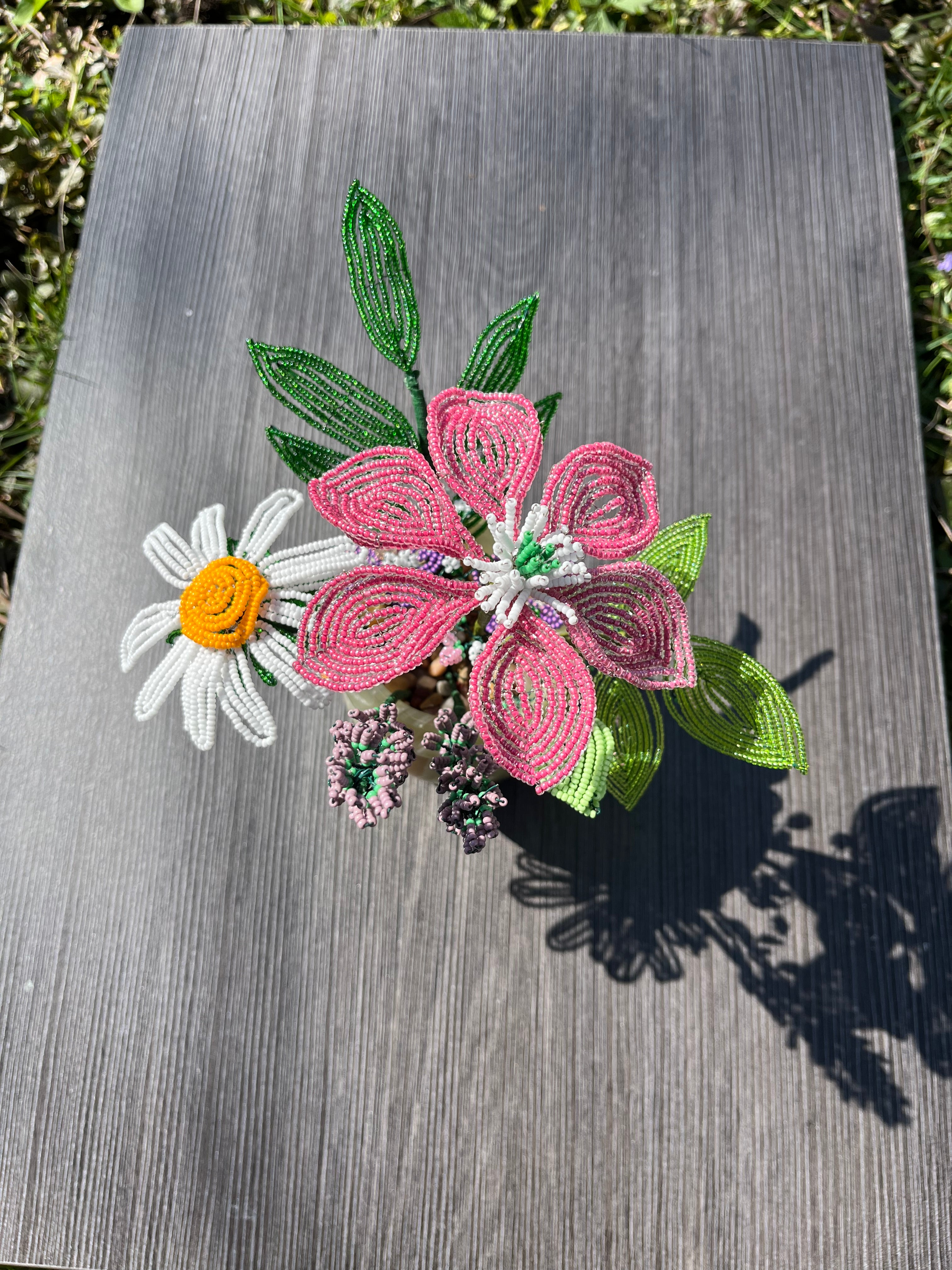 French beaded flowers in a green onyx vase