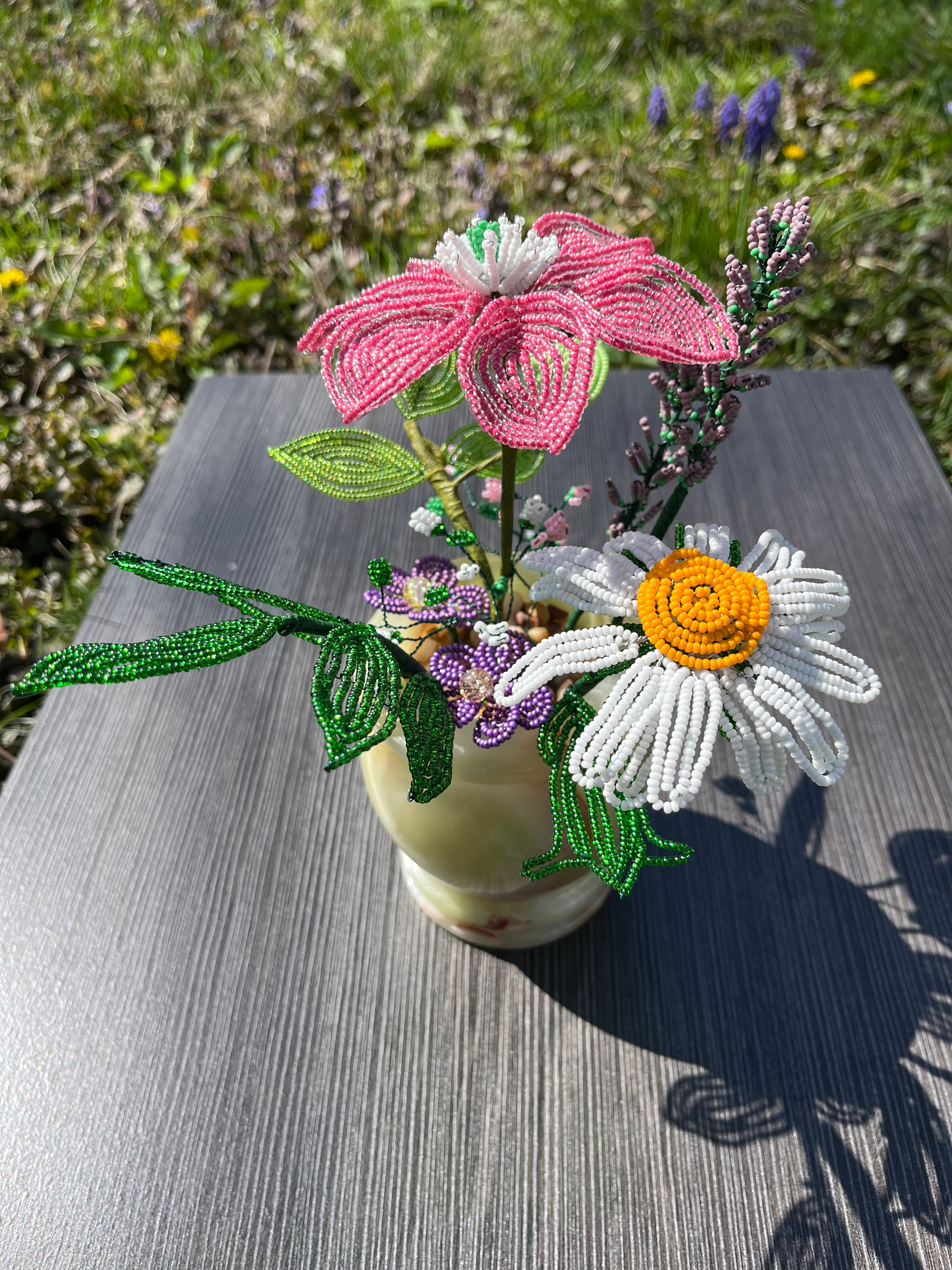 French beaded flowers in a green onyx vase