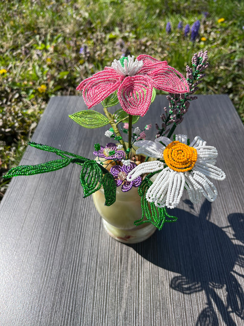 French beaded flowers in a green onyx vase