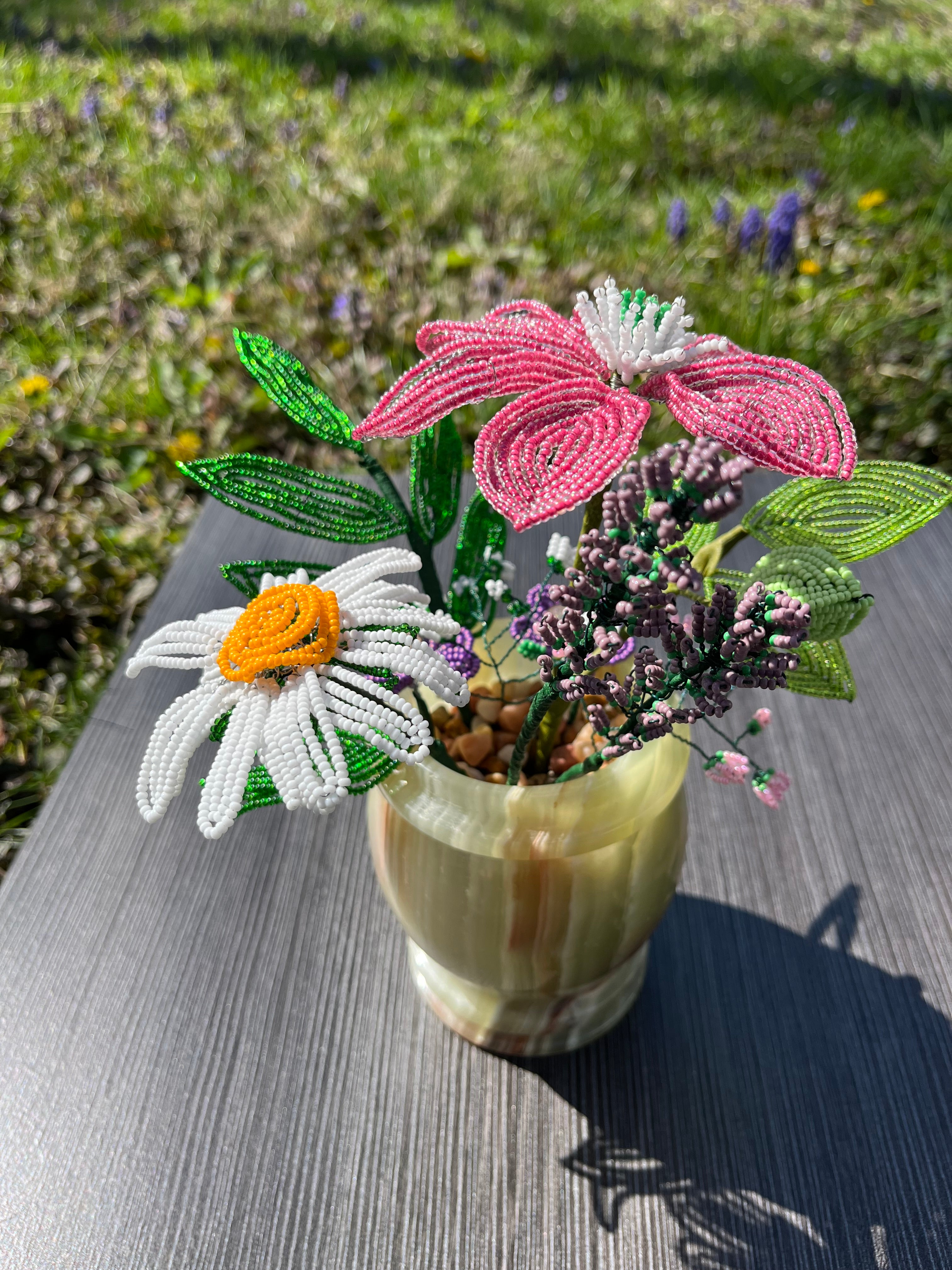 French beaded flowers in a green onyx vase